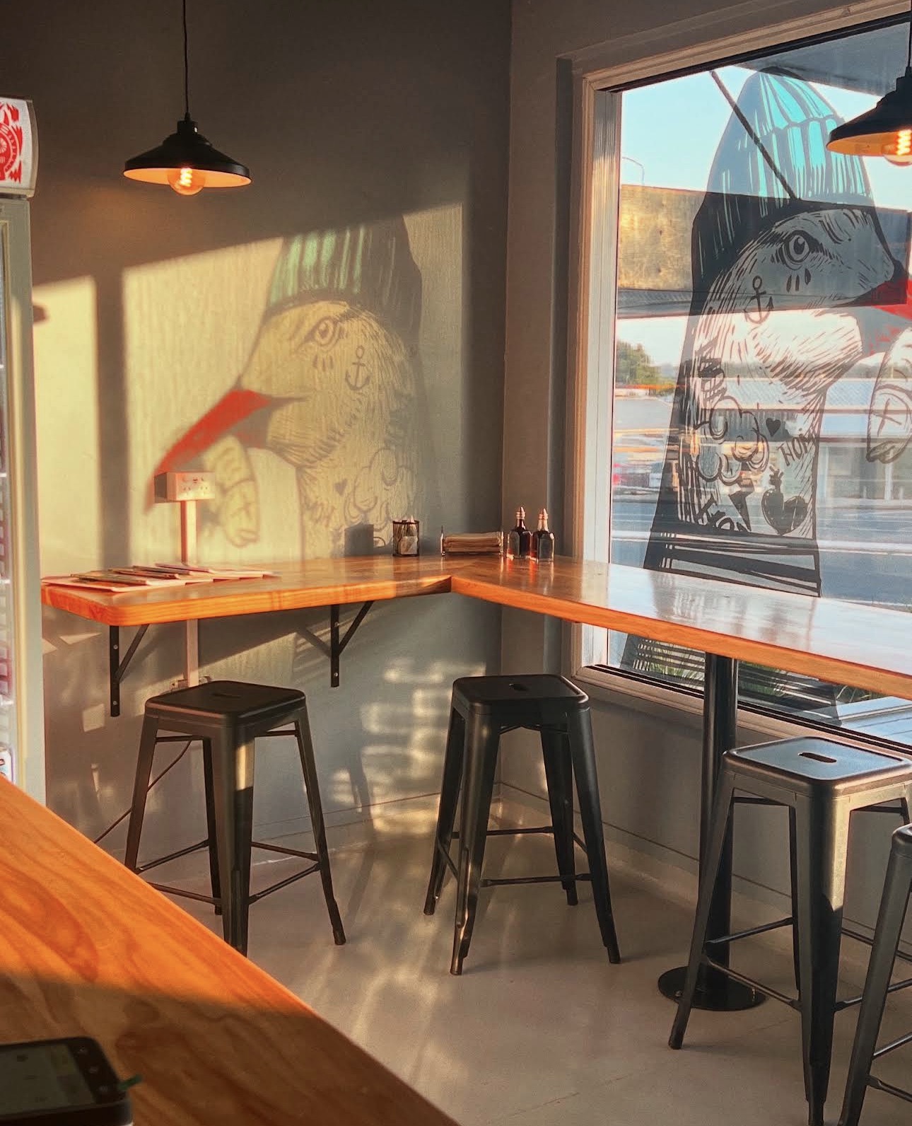 Warm afternoon light inside Bay Fish and Chips